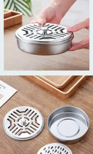 Vue détaillée du porte-spirale anti-moustique en inox, montrant la base et le couvercle.