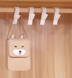 Juego de ganchos colgantes de plástico blanco para barra de armario y ropero, diseño duradero.