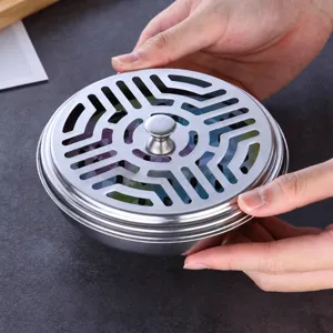 Stainless steel mosquito coil holder with lid, fireproof ash tray for home outdoor use.