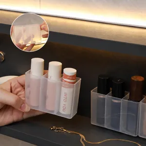 Caja de almacenamiento transparente de pared para artículos pequeños, pinceles y labiales.