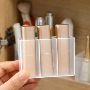 Organizador de maquillaje de pared de plástico transparente de 3 compartimentos para pintalabios