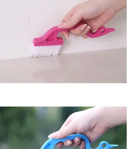 Swan shape groove crevice cleaning brush detail showing handheld cleaning use for window tracks.