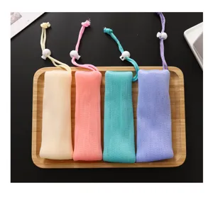 Detailed view of colorful mesh soap bags with drawstring and toggle, set of four for foaming.