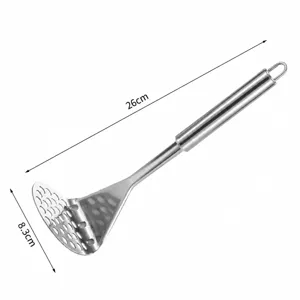 Stainless steel potato masher with L-shaped round holes and ergonomic handle for kitchen.