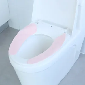 Pink waterproof adhesive toilet seat cover for bathroom, minimalist style for all seasons.