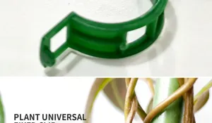 Green plastic plant fixing clip for garden vines and branches support, universal plant support.