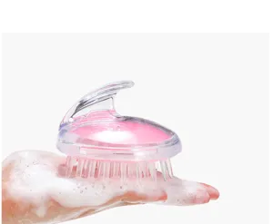 Detailed close-up view of a silicone scalp massage shampoo brush with soft bristles.
