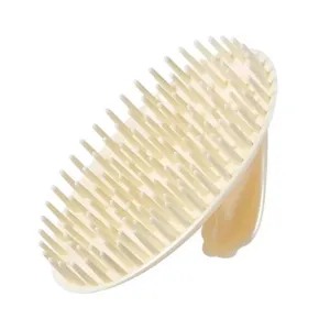 Brosse de massage du cuir chevelu en silicone pour le lavage, design ergonomique.