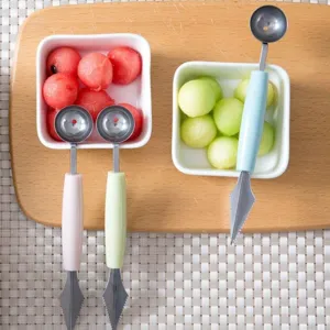 Ensemble cuillère à melon et couteau à sculpture en acier inoxydable pour cuisine.