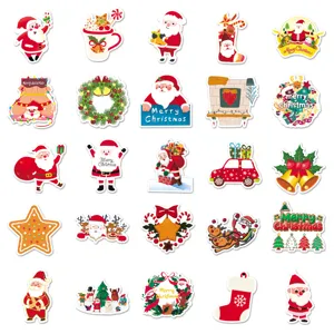 Close-up detail of cute Christmas stickers featuring Santa Claus and holiday crafts.