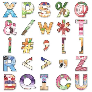 Close-up detail of creative cartoon fruit and dessert alphabet stickers for personalized DIY decor.