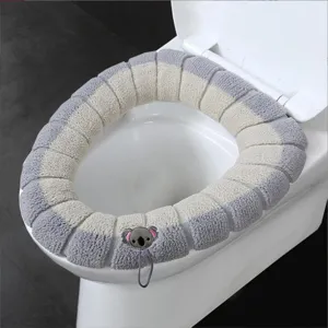 Thickened plush toilet seat cover, grey and white striped design with cute koala decor.