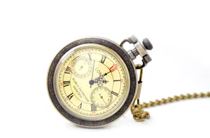 Vintage bronze pocket watch detail shot, antique roman numerals dial with chain showcase.
