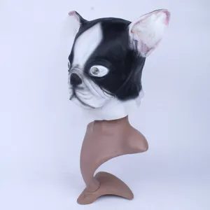 Close-up view of the funny black and white animal latex mask detail on display stand.
