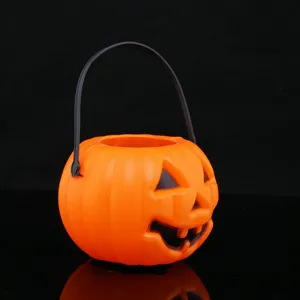 Halloween plastic pumpkin candy bucket, handheld glowing pumpkin prop for party bar decor.
