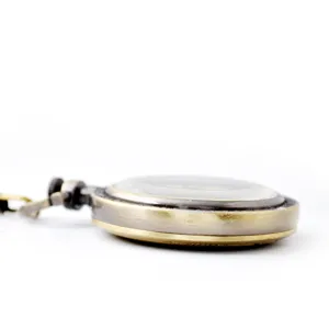Vintage bronze quartz pocket watch side detail view, classic retro design unisex accessory.