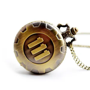 Vintage bronze quartz pocket watch with gear design and engraved 111 vault number and chain.