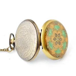 Vintage bronze pocket watch with colorful enamel flower carving and matching chain necklace.