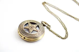 Vintage bronze hollow pentagram pocket watch detail showing exquisite star cover and chain design.