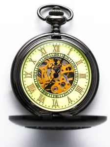 Vintage mechanical pocket watch dial detail with skeleton movement and Roman numerals.