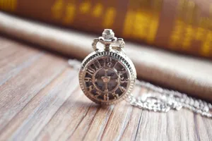 Silver vintage hollow pocket watch quartz necklace unisex fashion accessory detailed shot