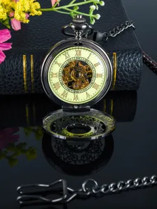 Classic vintage mechanical pocket watch featuring hollow movement and Roman numerals.