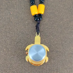Detail view of the vintage golden turtle pendant pocket watch, cute student quartz necklace.