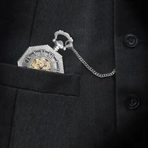 Detailed view of vintage silver skeleton mechanical pocket watch with Roman numerals and chain.
