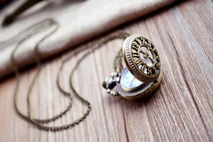 Vintage bronze hollow pocket watch with long chain quartz retro pocket watch for unisex design