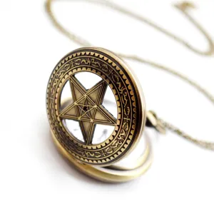 Vintage bronze quartz pocket watch with chain, featuring a hollow carved pentagram design.