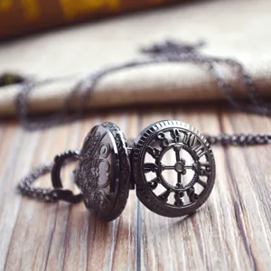 Vintage hollow carved pocket watch necklace with black metal finish and skeleton dial.