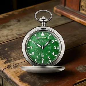 Vintage green dial quartz pocket watch with flip cover, calendar display and luminous hands.