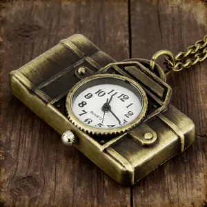 Vintage camera pocket watch with quartz movement and bronze chain, detailed retro design.