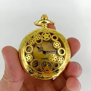 Vintage gold skeleton quartz pocket watch with intricate gear design for men women.