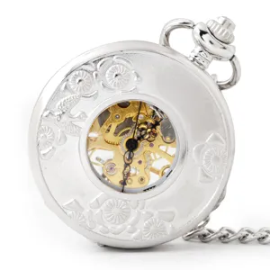 Silver vintage mechanical pocket watch with floral embossed design and skeleton dial.
