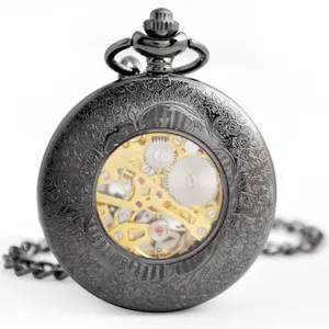 Vintage black mechanical pocket watch with hollow engraved floral case and metal chain.