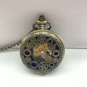 Vintage bronze mechanical pocket watch with skeleton gear design and chain for unisex.