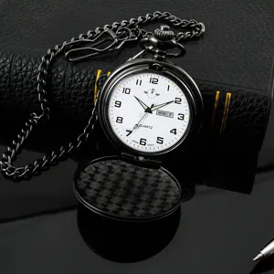 Detail view of a vintage black quartz pocket watch with white dial, double calendar and metal chain.
