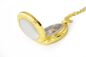 Vintage gold mechanical pocket watch with hollow flip cover and matching chain for daily wear.