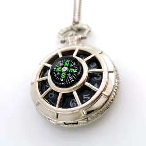Vintage silver tone compass pocket watch necklace featuring detailed dial markers and chain.