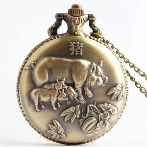 Detailed close-up of the vintage bronze quartz pocket watch featuring intricate pig zodiac.