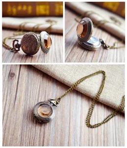 Vintage bronze pocket watch necklace with amber faceted gemstone, antique quartz timepiece.