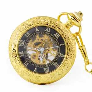 Gold vintage mechanical pocket watch with hollow carved case and classic roman numeral dial.