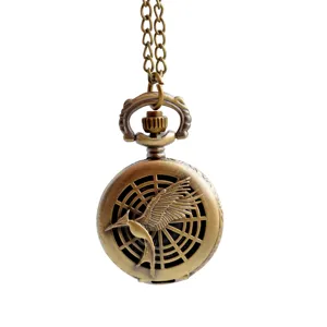 Vintage bronze quartz pocket watch featuring long chain and classic hollow bird relief design.