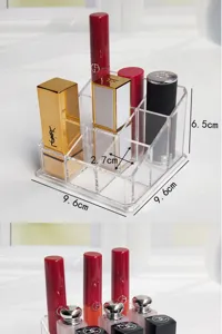 Clear acrylic 9-grid lipstick organizer detail view showing compact stepped storage structure.