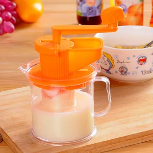 Presse-fruits manuel portable extracteur de jus transparent avec une tasse graduee