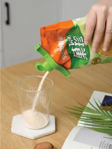 Green plastic bag sealing clip detail featuring convenient spout for easy powder and grain pouring.