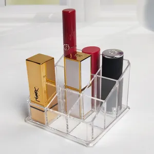 Clear acrylic 9-grid lipstick organizer desktop cosmetic storage display stand holder.