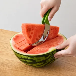 Stainless steel watermelon slicer cutter tool with green handle for fast fruit cutting kitchen