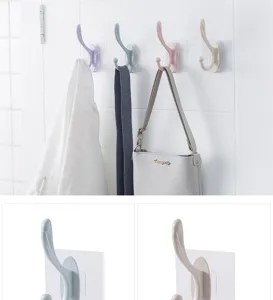 Adhesive wall hooks for hanging coats, bags and keys in entryway or bedroom effortlessly.